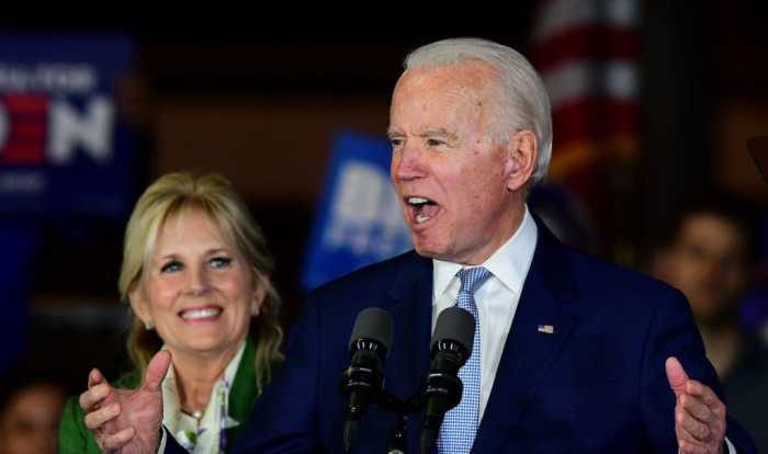 Democratic presidential hopeful former Vice President Joe Biden accompanied by his wife Jill Biden, speaks during a Super Tuesday event in Los Angeles, California, on March 3, 2020.