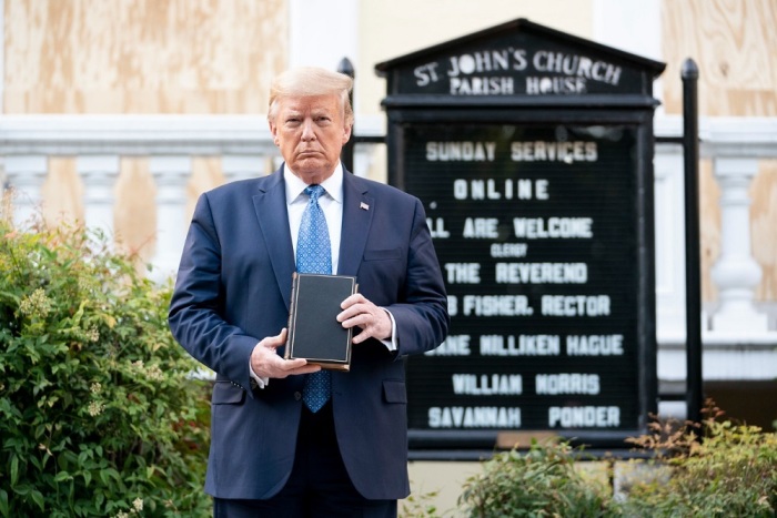 President Donald Trump holds a Bible while visiting St. John's Church across from the White House in Washington, D.C., after the area was cleared of people protesting the death of George Floyd June 1, 2020.