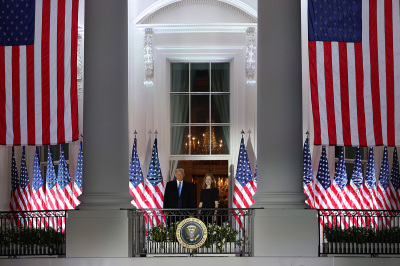 President Donald Trump and newly sworn-in U.S. Supreme Court Associate Justice Amy Coney Barrett look on during a ceremonial swearing-in on the South Lawn of the White House October 26, 2020, in Washington, D.C. The Senate confirmed Barrett’s nomination to the Supreme Court today by a vote of 52-48.