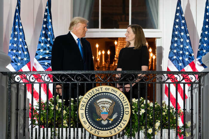 President Donald J. Trump and U.S. Supreme Court Associate Justice Amy Coney Barrett stand together on the Blue Room balcony Monday, Oct. 26, 2020, following Justice Barrett’s swearing-in ceremony on the South Lawn of the White House.