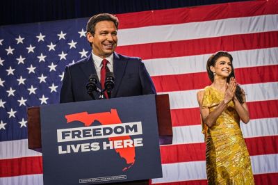 Florida Gov. Ron DeSantis, flanked by and his wife, Casey DeSantis, speaks to supporters during an election night watch party at the Convention Center in Tampa, Florida, on Nov. 8, 2022. - Florida Governor Ron DeSantis, who has been tipped as a possible 2024 presidential candidate, was projected as one of the early winners of the night in Tuesday's midterm election. (Photo by Giorgio VIERA / AFP) (Photo by GIORGIO VIERA/AFP via Getty Images)