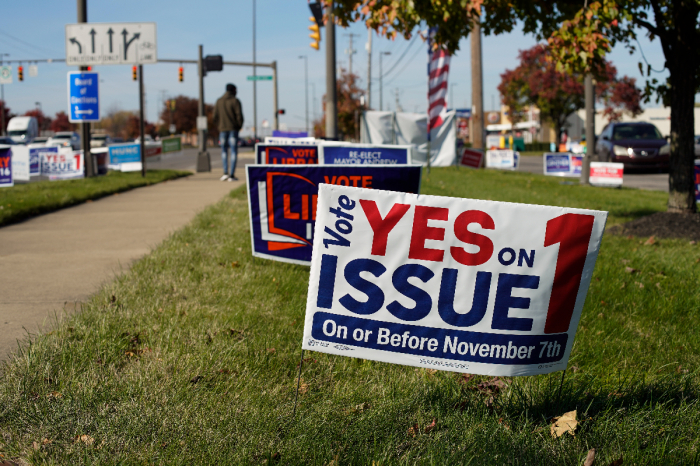 A close-up view of signage in support of Issue 1 is seen on Nov. 3, 2023 in Columbus, Ohio.
