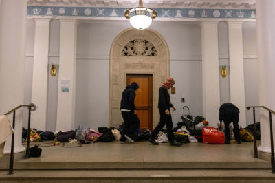 Demonstrators from the pro-Palestine encampment on Columbia's Campus barricade themselves inside Hamilton Hall, an academic building which has been occupied in past student movements, on Tuesday, April 30, 2024 in New York City. Pro-Palestinian demonstrators marched around the 'Gaza Solidarity Encampment' at Columbia University as a 2 P.M. deadline to clear the encampment given to students by the university passed. The students were given a suspension warning if they do not meet the deadline. Columbia students were the first to erect an encampment in support of Palestine, with students demanding that the school divest from Israel amid the Israel-Hamas war, where more than 34,000 Palestinians have been killed in the Gaza Strip.