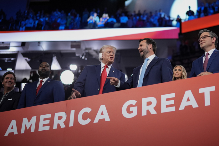 Republican presidential candidate, former U.S. President Donald Trump (L) and Republican Vice Presidential candidate, U.S. Sen. J.D. Vance, R-Ohio, appear on the first day of the Republican National Convention at the Fiserv Forum on July 15, 2024 in Milwaukee, Wisconsin. Delegates, politicians, and the Republican faithful are in Milwaukee for the annual convention, concluding with former President Donald Trump accepting his party's presidential nomination. The RNC takes place from July 15-18.