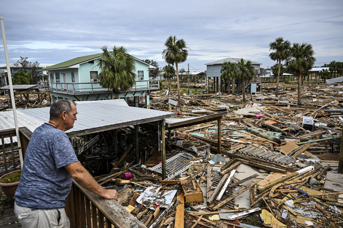 David Hester inspects damages of his house after Hurricane Helene made landfall in Horseshoe Beach, Florida, on Sept. 28, 2024. At least 44 people died across five U.S. states battered by powerful storm Helene, authorities said on Sept. 27, after torrential flooding prompted emergency responders to launch massive rescue operations.