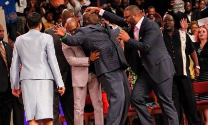 Tongues-talking Tyler Perry caught on video raining ‘dollars’ on stripper at Usher concert